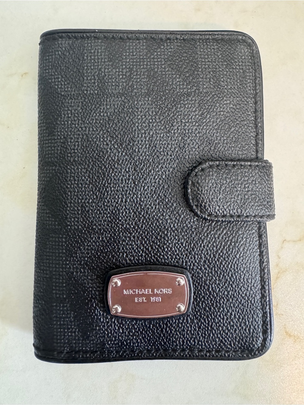 Michael Kors Black Textured Passport Wallet/Holder With Metal Logo Plaque